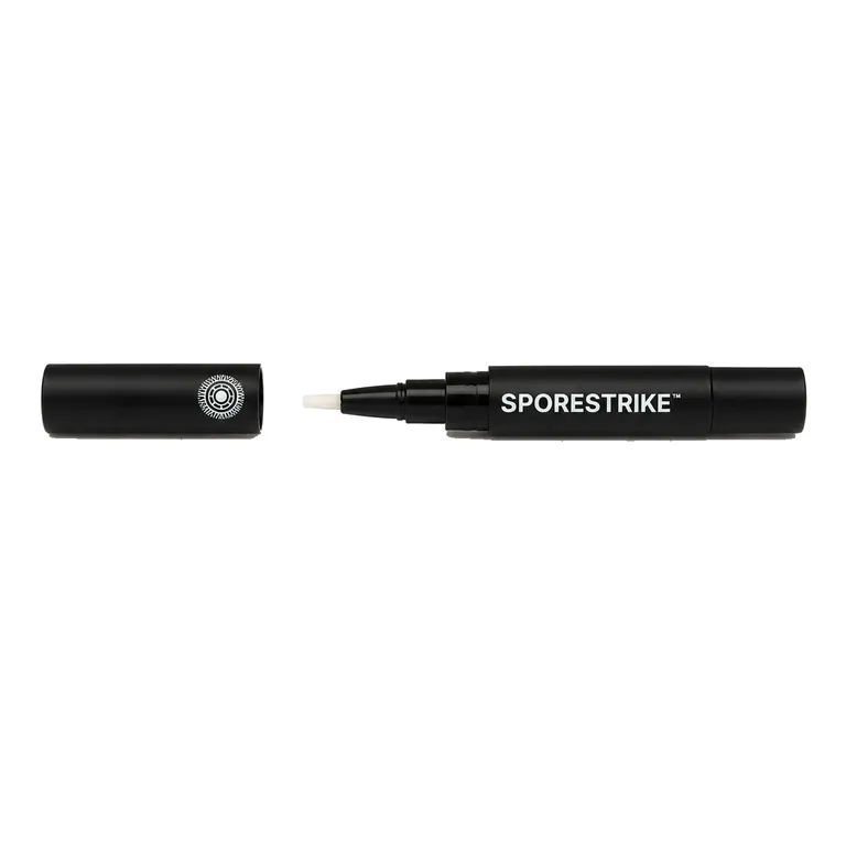 Sporestrike pen with the cap off, showing the brush applicator tip